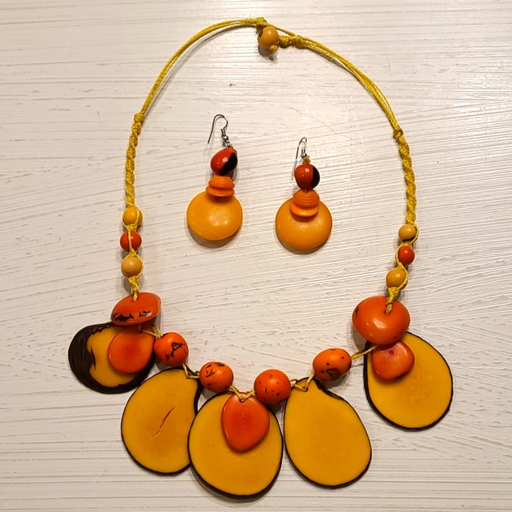 Orange and Yellow beaded necklace from Ecuadorian trees and matching earrings.